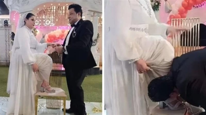 عريس يقبل قدم عروسه