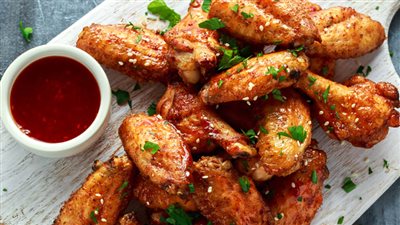 تعلمى طريقة عمل أجنحة الدجاج بالعسل  