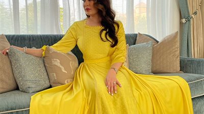 تفسير حلم  إرتداء الفستان الأصفر في المنام للعزباء والمتزوجة والحامل