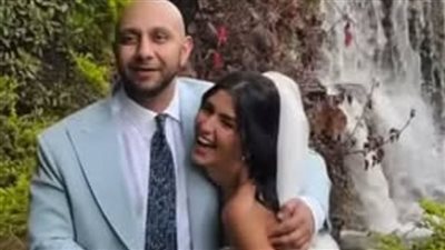 عروس نجل الشاعر بهاء الدين محمد تتألق بفستان الأميرات في حفل زفافها 