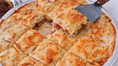 لعزومات عيد الأضحي ..  طريقة عمل صينية الرقاق باللحمة المفرومة