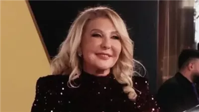 نادية الجندي تثير الجدل في جلسة تصوير جديدة بالأبيض القصير وبرفقة فيراري