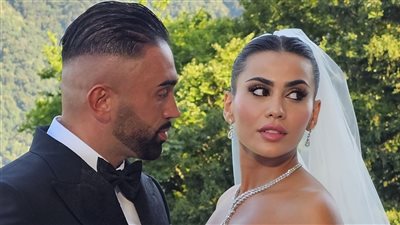 يومي خوري تتألق بزفافها بتوقيع دولتشي آند جابانا على ضفاف بحيرة كومو