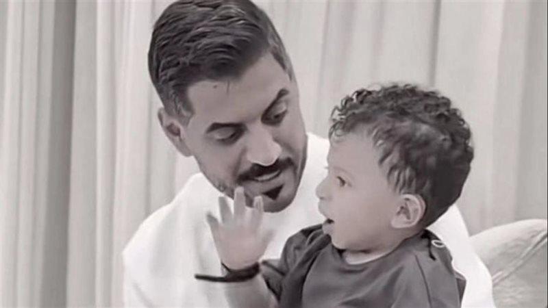 الطفل عساف مع والده