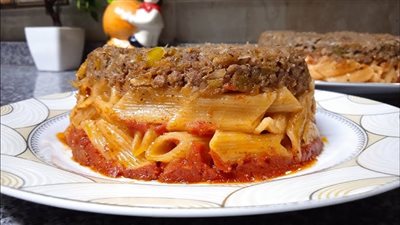 طريقة عمل طاجن المكرونة باللحمة المفرومة بخطوات بسيطة في مطبخك 