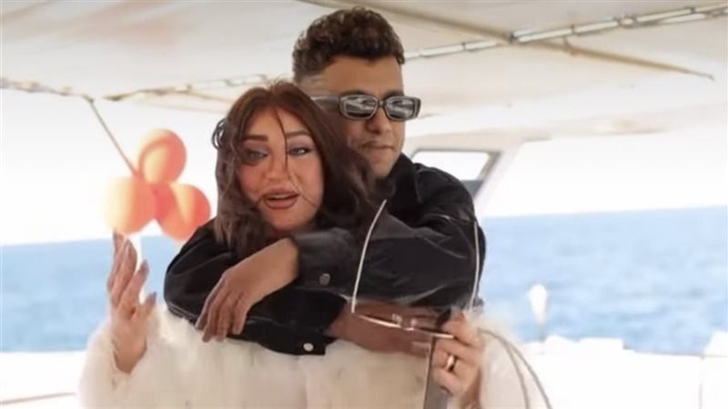 عصام صاصا مع زوجته جهاد أحمد