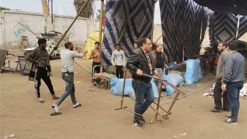 مشادة رئيسة حي الزاوية الحمراء 