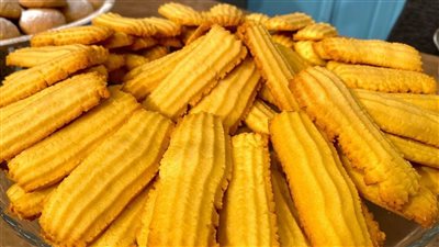 حلويات عيد الفطر .. طريقة عمل بسكويت البرتقال اللذيذ