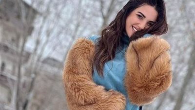 بعد إصدار «الكاهن».. درة تستمتع بإجازتها مع رجل الثلج