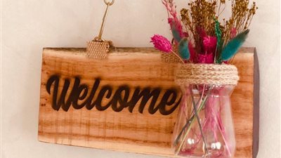 «ندا محمود».. حوّلت الورد الصناعي لإبداعات في فن الهاند ميد والديكور