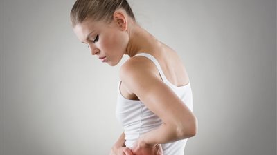 تعرفي على الفارق بين آلام الظهر والكلية