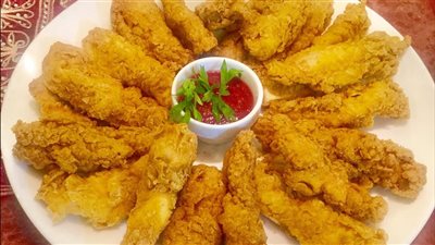 على سفرة رمضان 2023| طريقة عمل «ستريبس الدجاج» المقرمش على الإفطار