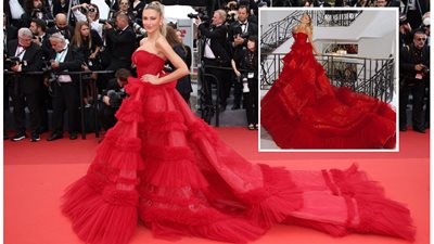 البريطانية «زارا ماكديرموت» بفستان أحمر زاهي في مهرجان كان السينمائي 