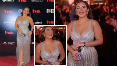 أسماء شريف منير بإطلالة فضية ساحرة برفقة والدها على السجادة الحمراء