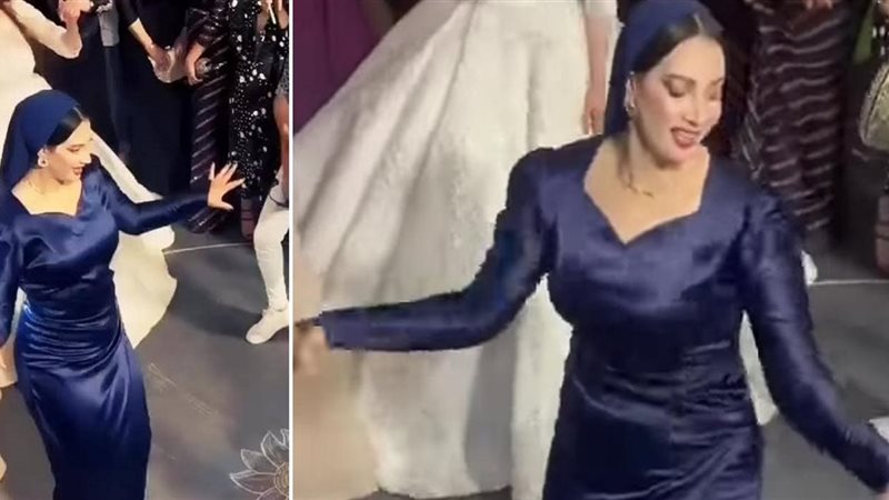 صاحبة الفستان الأزرق