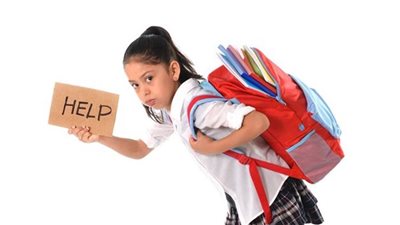 7 شروط لحماية ظهر طفلك من شنطة المدرسة