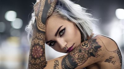 تفسير حلم الوشم في المنام للعزباء والمتزوجة