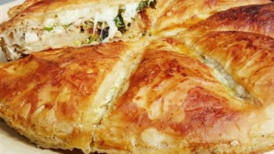 طريقة عمل صينية الجلاش بالجبن والخضروات «بأقل من 50 جنيه»