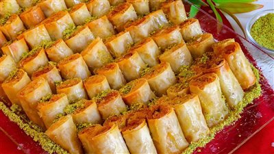 حلويات رمضان 2024.. طريقة عمل أصابع الجلاش بالكنافة